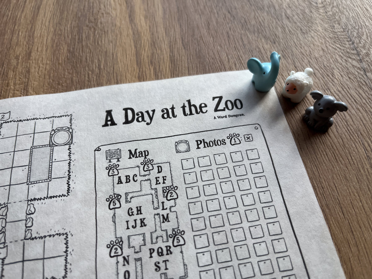 A Day at the Zoo map and photo tracker with small animal figures