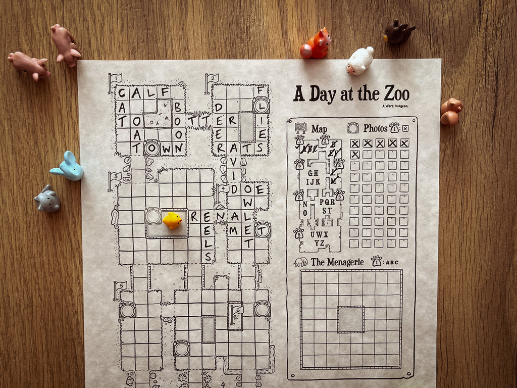 A Day at the Zoo game in progress surrounded by small animal figures
